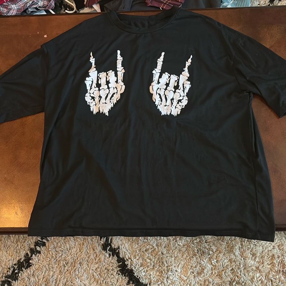 Skeleton hands over sized t-shirt